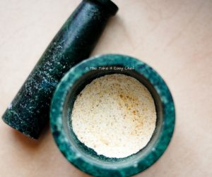 Powder the roasted urad dal and fenugreek mix