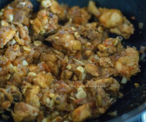 Garlic Chicken Steps - Onion-tomato mix added to the chicken