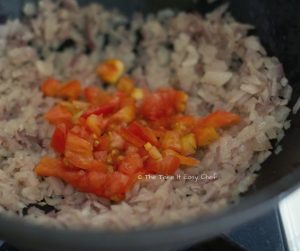 Garlic Chicken Steps - Adding chopped tomato