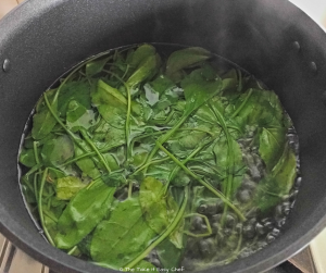 Bibimbap cooking steps - spinach cooked in boiling water