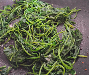 Bibimbap cooking steps - spinach tossed in sesame oil