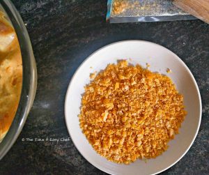Crushed cornflakes to coat the chicken pieces