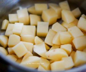 Cook and mash potatoes