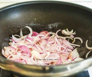 Onions sauted in a pan with oil