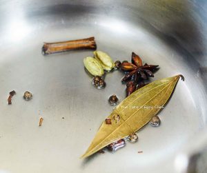 Fry the whole spices in some oil