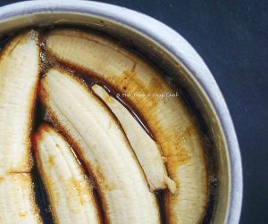 Place bananas into the hot caramel