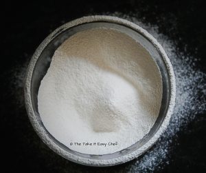 Flour sieved for the Pull-Apart Cheesy Garlic Bread