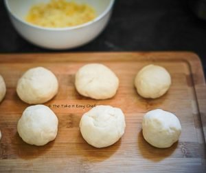Shape the dough into balls for the Pull-Apart Cheesy Garlic Bread