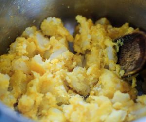 Peel and mash the potatoes