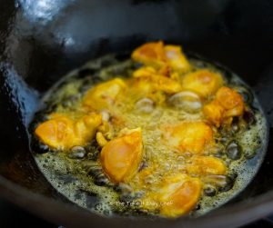 Chicken Chinthamani Steps - Fry the chicken pieces