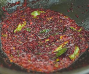 Chicken Perattu Steps - Mix well and fry the leaves