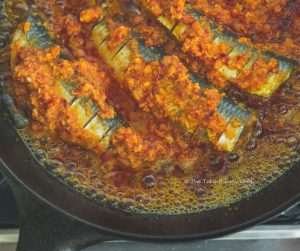 Thalassery Style Sardine Fry Steps - Extra marinade added to the pan