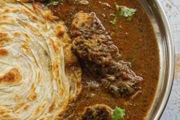 Featured image of chicken salna along with parotta