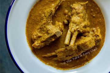 Picture of hands holding Mutton Chops Karnataka Style
